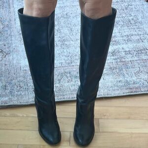 Black Cole Haan leather boots. Brown heel